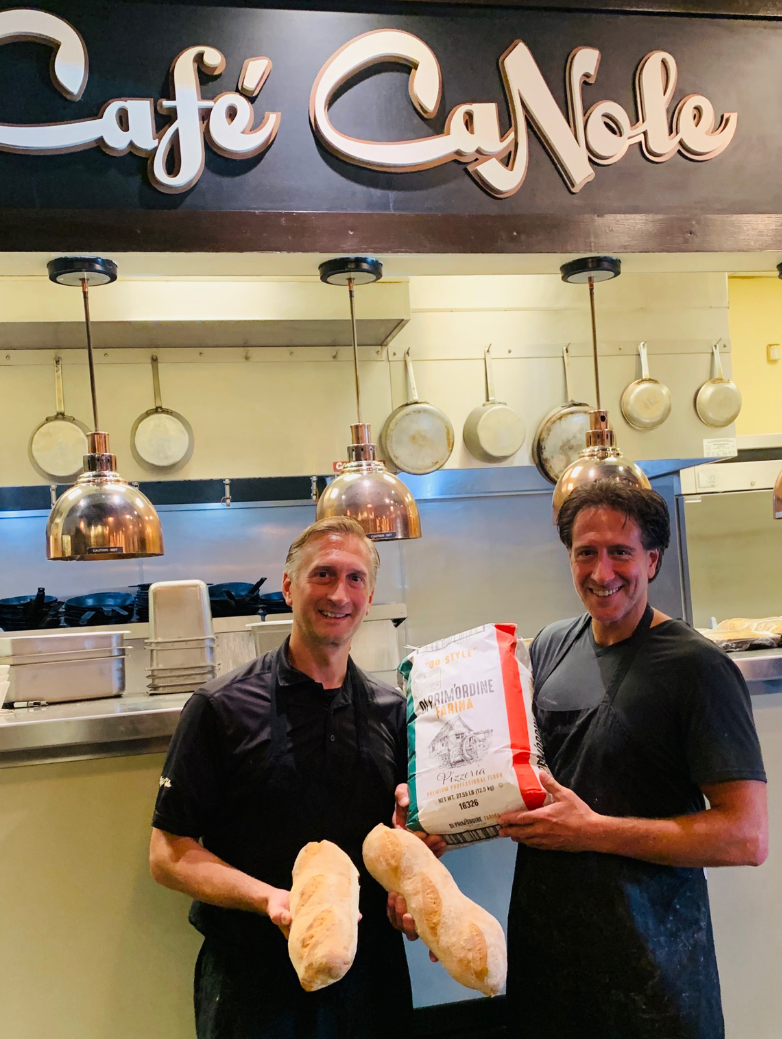Dean Nole holding new flour at Cafe CaNole